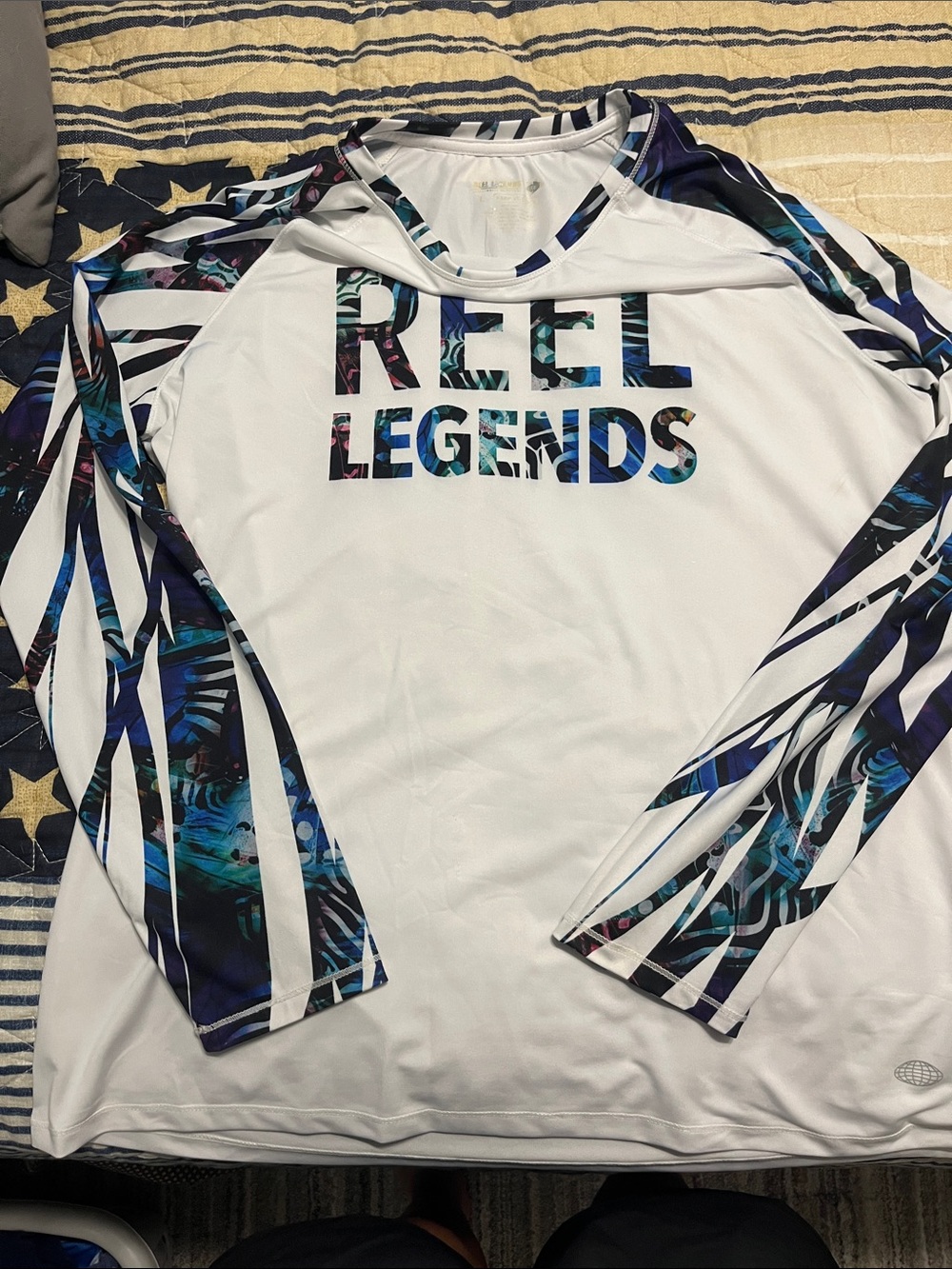 Reel Legends White Performance Long-Sleeve with Blue Teal Graphic Sleeves